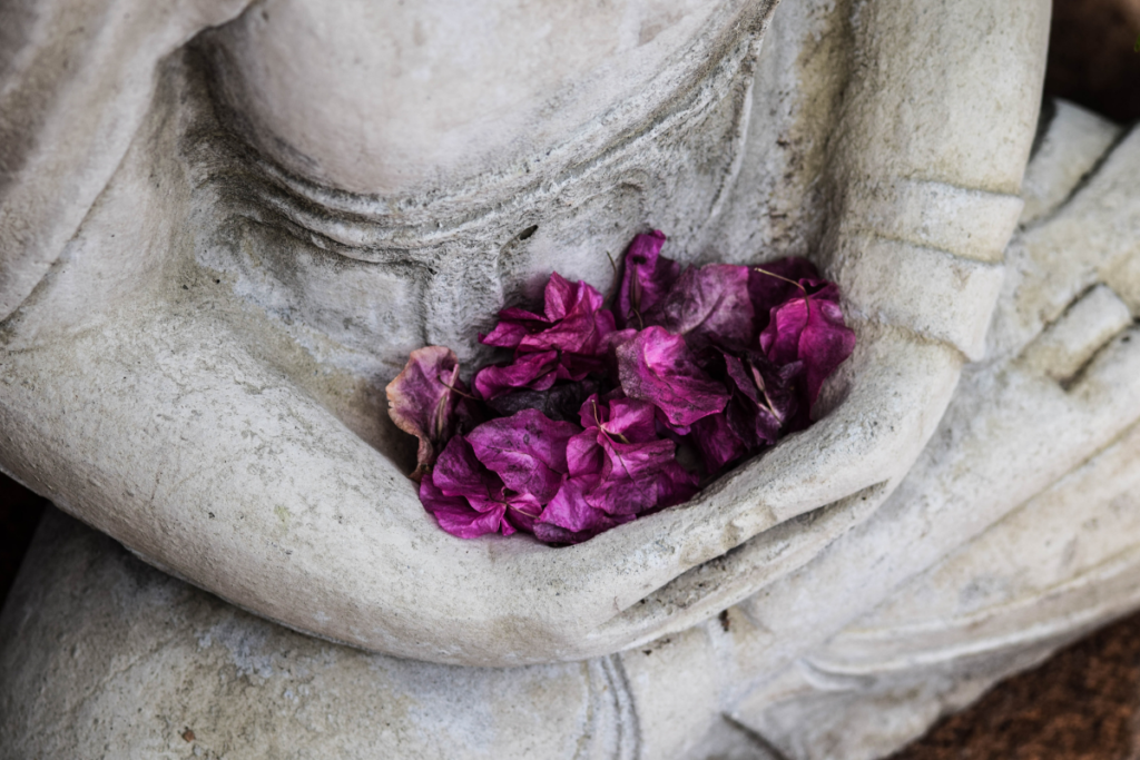 A statue holding pedals in honor of a woman's condition - endometriosis.
